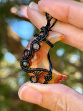 Load image into Gallery viewer, Artisan cab (positive rock) carnelian moon with rutile quartz + garnet gem accents wire wrapped pendant necklace
