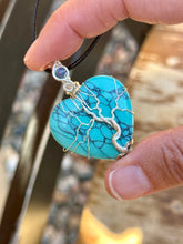 Load image into Gallery viewer, Blue (dyed) Magnesite tree of life with sapphire inclusion Wire wrapped pendant
