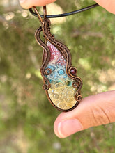 Load image into Gallery viewer, Rainbow Fossilized Palm Root with garnet gem accent wire wrapped pendant necklace
