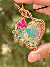 Load image into Gallery viewer, Artisan cab (adit stones) rainbow fossilized coral with blue apatite, turquoise, peridot gem accents wire wrapped pendant necklace
