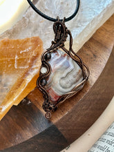 Load image into Gallery viewer, Reserved for Ann c DESIGNER STONE Mexican crazy lace agate with obsidian + citrine inclusions Wire wrapped pendant
