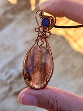 Load image into Gallery viewer, Iolite with sunstone with lapis lazuli inclusion   Wire wrapped pendant
