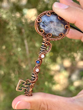 Load image into Gallery viewer, Iolite with moonstone + lapis lazuli gem accents wire wrapped skeleton key pendant necklace
