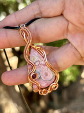 Load image into Gallery viewer, Rhodochrosite with Rhodonite and Ruby inclusions wire wrapped pendant talisman necklace
