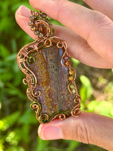 Load image into Gallery viewer, Artisan cab (positive rock) Scenic Plume Jasper with Garnet, Orange Garnet, Yellow Mookaite, Tiger Eye, Serpentine + Peridot Gem Accents wire wrapped pendant necklace
