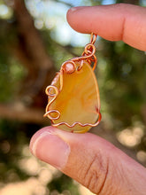 Load image into Gallery viewer, Orange agate with  sunstone gem accent wire wrapped pendant necklace
