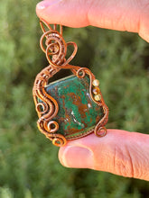 Load image into Gallery viewer, Artisan cab (johari gems)  green chrysocolla with peridot + tiger eye wire wrapped pendant necklace
