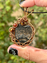 Load image into Gallery viewer, Black Crazy Lace Agate with red jasper + tigers eye gem accents wire wrapped pendant necklace
