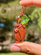 Load image into Gallery viewer, Goldstone “pumpkin” with green aventurine + peridot gem accents wire wrapped pendant necklace
