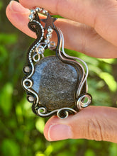 Load image into Gallery viewer, Black sunstone with hematite star, grey moonstone, onyx gem accents wire wrapped pendant necklace
