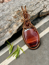 Load image into Gallery viewer, Red tiger eye with Baltic amber gem accent wire wrapped pendant necklace
