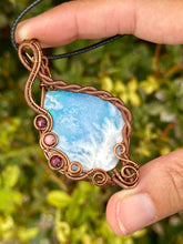 Load image into Gallery viewer, ARTISAN cab (flintstone studio) Aurora Opal Plume Agate Doublet with Ruby + Rhodonite inclusions wire wrapped pendant talisman necklace
