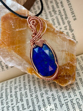 Load image into Gallery viewer, Faceted lapis lazuli with hematite heart Wire wrapped pendant
