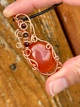 Load image into Gallery viewer, Carnelian with tigers eye + garnet inclusions Wire wrapped pendant
