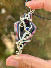 Load image into Gallery viewer, ARTISAN STONE Fordite with onyx + lapis lazuli gem accents wire wrapped pendant necklace
