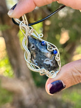 Load image into Gallery viewer, ARTISAN CAB (flintstone cabs) Marcasite in black agate with lapis lazuli + pyrite gem accents wire wrapped pendant necklace
