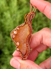 Load image into Gallery viewer, Artisan cab (positive rock) half polished carnelian with druzy with sunstone + rose quartz + copper  gem accents wire wrapped pendant necklace
