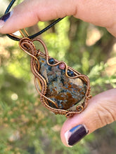 Load image into Gallery viewer, Faceted Pietersite with sapphire + Rhodonite gem inclusions wire wrapped pendant necklace
