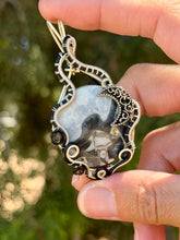 Load image into Gallery viewer, Artisan cab (positive rocks) black scenic maligano jasper with obsidian + labradorite gem accent wire wrapped pendant necklace
