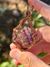 Load image into Gallery viewer, Rainbow fluorite with blue kyanite + amethyst gem accents wire wrapped pendant necklace
