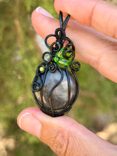 Load image into Gallery viewer, Silver sheen obsidian “pumpkin” with green mica + serpentine gem accents wire wrapped  pendant necklace
