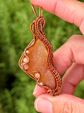 Load image into Gallery viewer, Artisan cab (positive rock) half polished carnelian with druzy with sunstone + rose quartz + copper  gem accents wire wrapped pendant necklace
