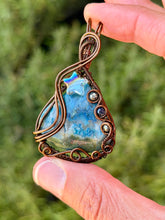 Load image into Gallery viewer, Artisan cab (positive rocks) Blue (dyed) Indonesian moss agate with pyrite + sapphire gem accents wire wrapped pendant necklace
