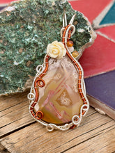 Load image into Gallery viewer, Artisan cab (positive rocks) orange tube agate with dandelion + moonstone gem accents  wire wrapped pendant necklace
