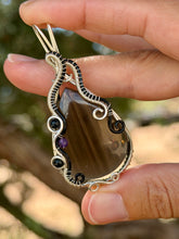 Load image into Gallery viewer, Artisan cab (positive rock) black lace obsidian with blue tiger eye + amethyst gem accent wire wrapped pendant necklace
