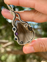 Load image into Gallery viewer, Artisan cab (positive rock) black lace obsidian with blue tiger eye + amethyst gem accent wire wrapped pendant necklace
