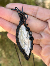 Load image into Gallery viewer, ARTISAN stone (Alisha Stolstig) White crazy lace agate with onyx + rutile quartz gem accents wire wrapped pendant necklace
