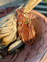 Load image into Gallery viewer, Goldstone “pumpkin” with green aventurine + peridot gem accents wire wrapped pendant necklace
