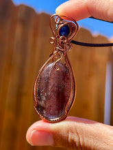 Load image into Gallery viewer, Iolite with sunstone with lapis lazuli inclusion   Wire wrapped pendant
