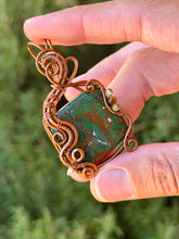 Load image into Gallery viewer, Artisan cab (johari gems)  green chrysocolla with peridot + tiger eye wire wrapped pendant necklace
