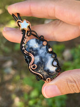 Load image into Gallery viewer, Artisan cab (positive rocks) scenic black maligano with sunstone, hematite, rutile quartz, opalite gem accents wire wrapped pendant necklace
