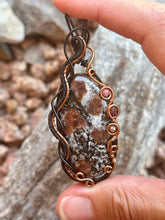 Load image into Gallery viewer, Artisan cab (johari gems) eudialyte with thulite + ruby gem accents wire wrapped pendant necklace
