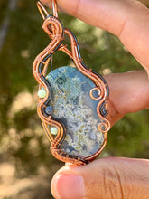 Load image into Gallery viewer, Artisan cab (positive rock) sky moss agate doublet with chrysopease + dumortierite gem accent wire wrapped pendant necklace
