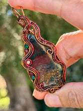 Load image into Gallery viewer, Artisan cab (positive rock) Indian bloodstone with malachite, garnet,  mookaite gem accents wire wrapped pendant necklace

