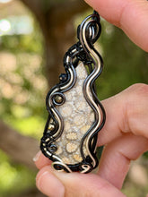 Load image into Gallery viewer, Artisan cab (positive rocks) fossilized coral with pyrite + onyx gem accents wire wrapped pendant necklace
