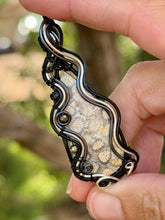 Load image into Gallery viewer, Artisan cab (positive rocks) fossilized coral with pyrite + onyx gem accents wire wrapped pendant necklace
