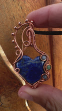 Load and play video in Gallery viewer, Reserved for Sarah j Lapis Lazuli with Gem inclusions Wire Wrapped Pendent Necklace
