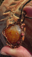Load and play video in Gallery viewer, Reserved for Lisa t Carnelian with inclusions Wire Wrapped Pendent Necklace
