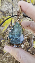 Load and play video in Gallery viewer, Reserved for Keri k Azurite/Shattuckite with Gem inclusions Wire Wrapped Pendent Necklace
