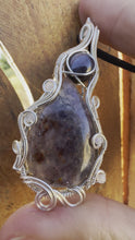 Load and play video in Gallery viewer, Reserved for robin p Iolite with Star Sapphire + Moonstone Gem Inclusions Wire Wrapped Pendent Necklacee

