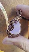 Load and play video in Gallery viewer, Reserved for Rachel h Moonstone with Ruby gem inclusion Wire Wrapped Pendent Necklace

