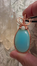 Load and play video in Gallery viewer, Reserved for Trish s Blue Chalcedony with Moonstone Gem Inclusions Wire Wrapped Pendent Necklace
