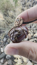 Load and play video in Gallery viewer, Reserved for Denise a Mookaite with Garnet Gem Inclusion Wire Wrapped Pendent Necklace
