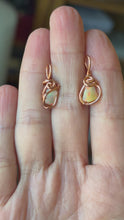 Load and play video in Gallery viewer, Mini Ethiopian opal fiery wire wrapped pendant necklace
