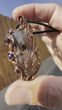 Load and play video in Gallery viewer, Reserved for Sarah s Super Seven with Gemstone Inclusions Wire Wrapped Pendent Necklace
