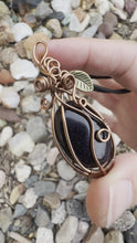 Load and play video in Gallery viewer, Reserved for krista m Blue Goldstone Wire Wrapped Pumpkin Pendent
